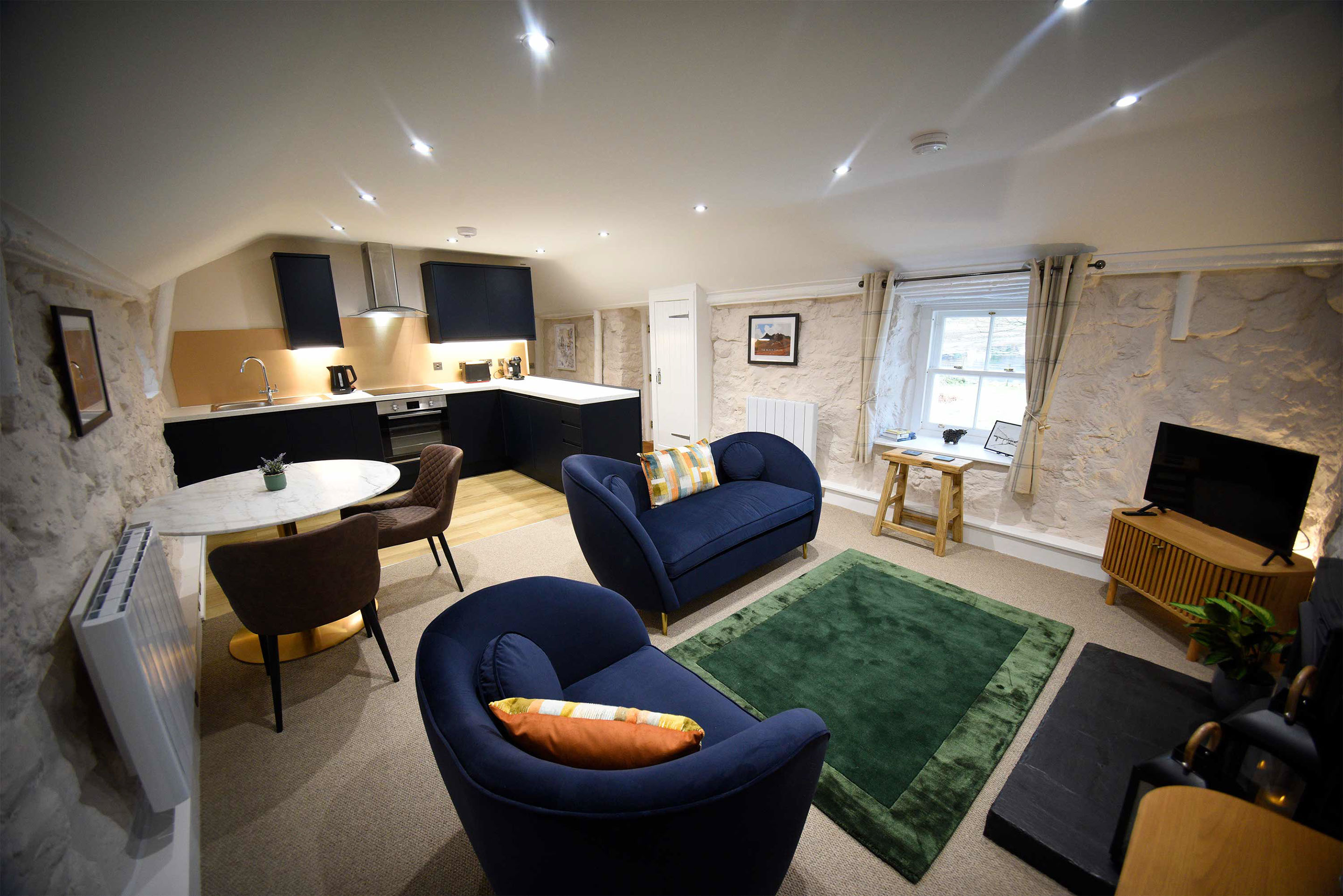 Our self catering accommodation in Luib Katie Ann's Thatched Cottage contains an open plan kitchen and living room